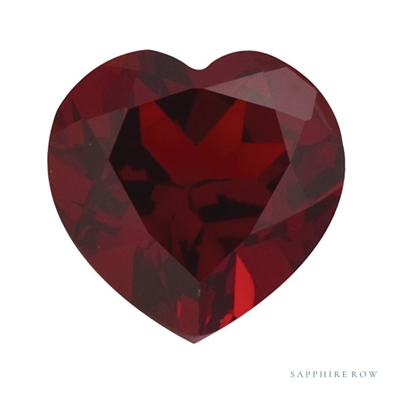 6 mm natural dark orange red mozambique garnet, heart cut | Sapphire Row · cut7