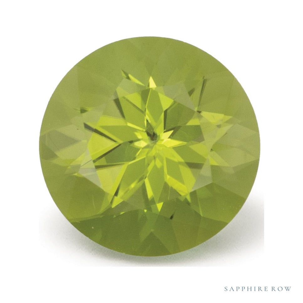3.02 ct natural green peridot from Pakistan, round cut | Sapphire Row · cut7