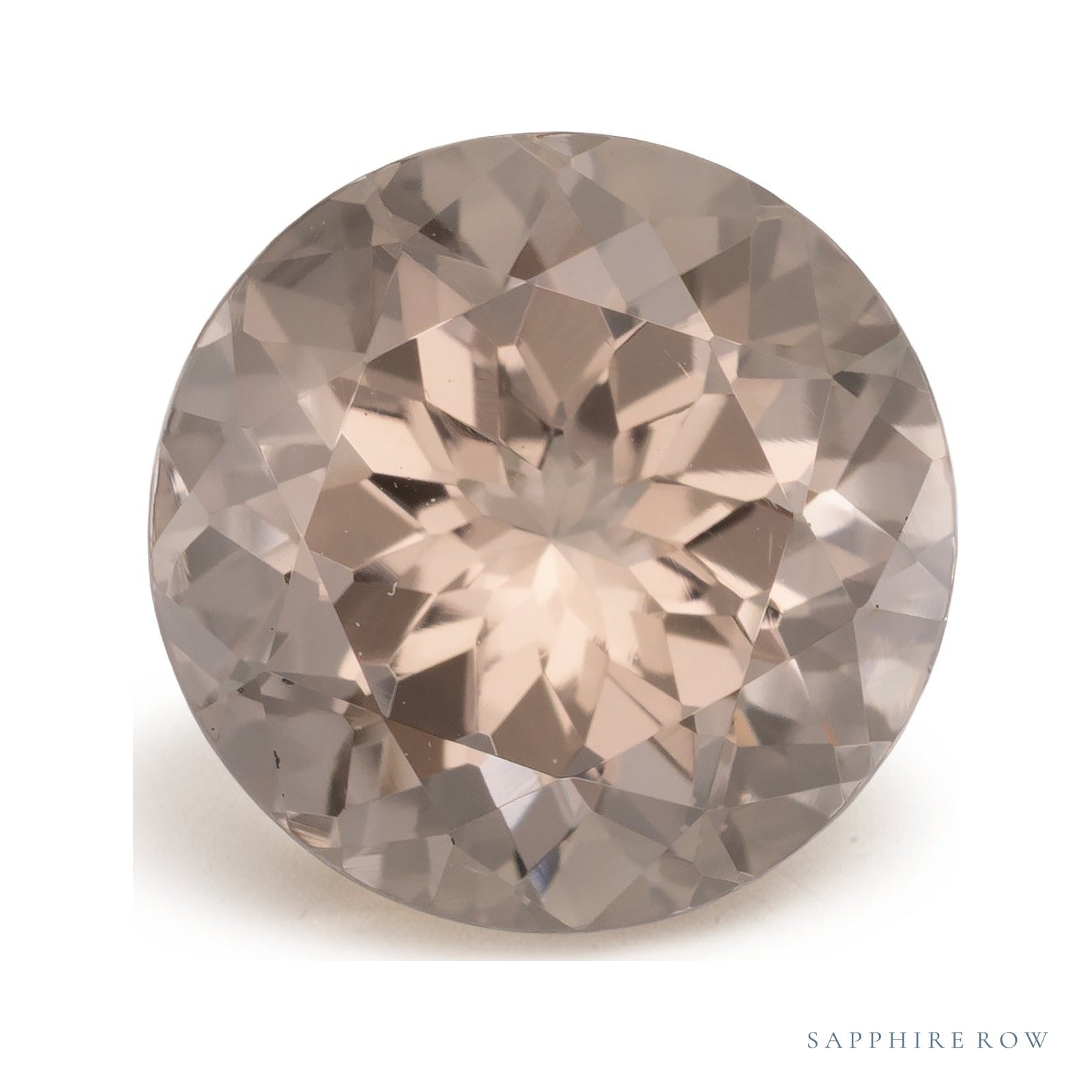 2.89 ct natural peach morganite from Mozambique, round cut | Sapphire Row · cut4
