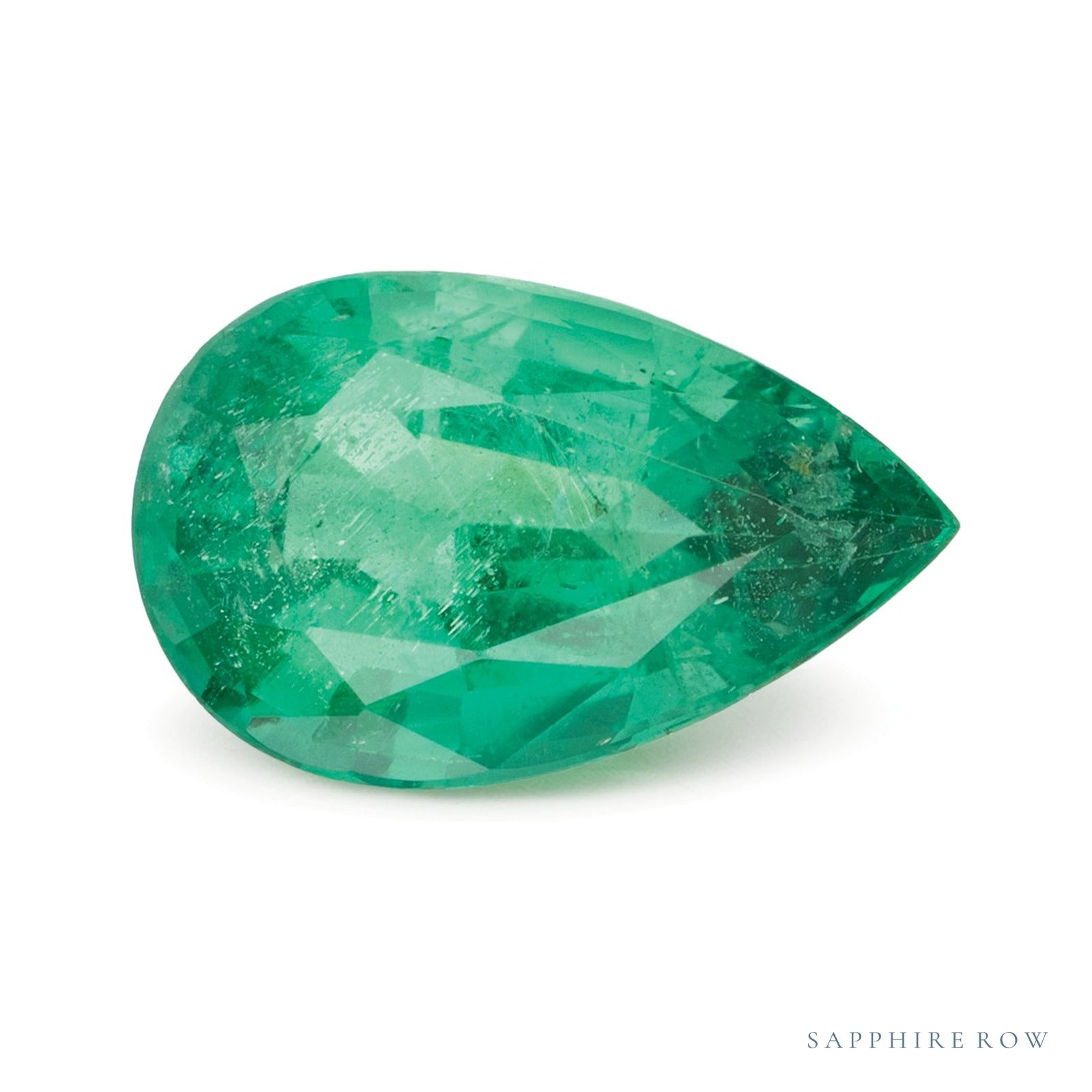 2.61 ct natural green emerald from Zambia, pear cut | Sapphire Row · cut4