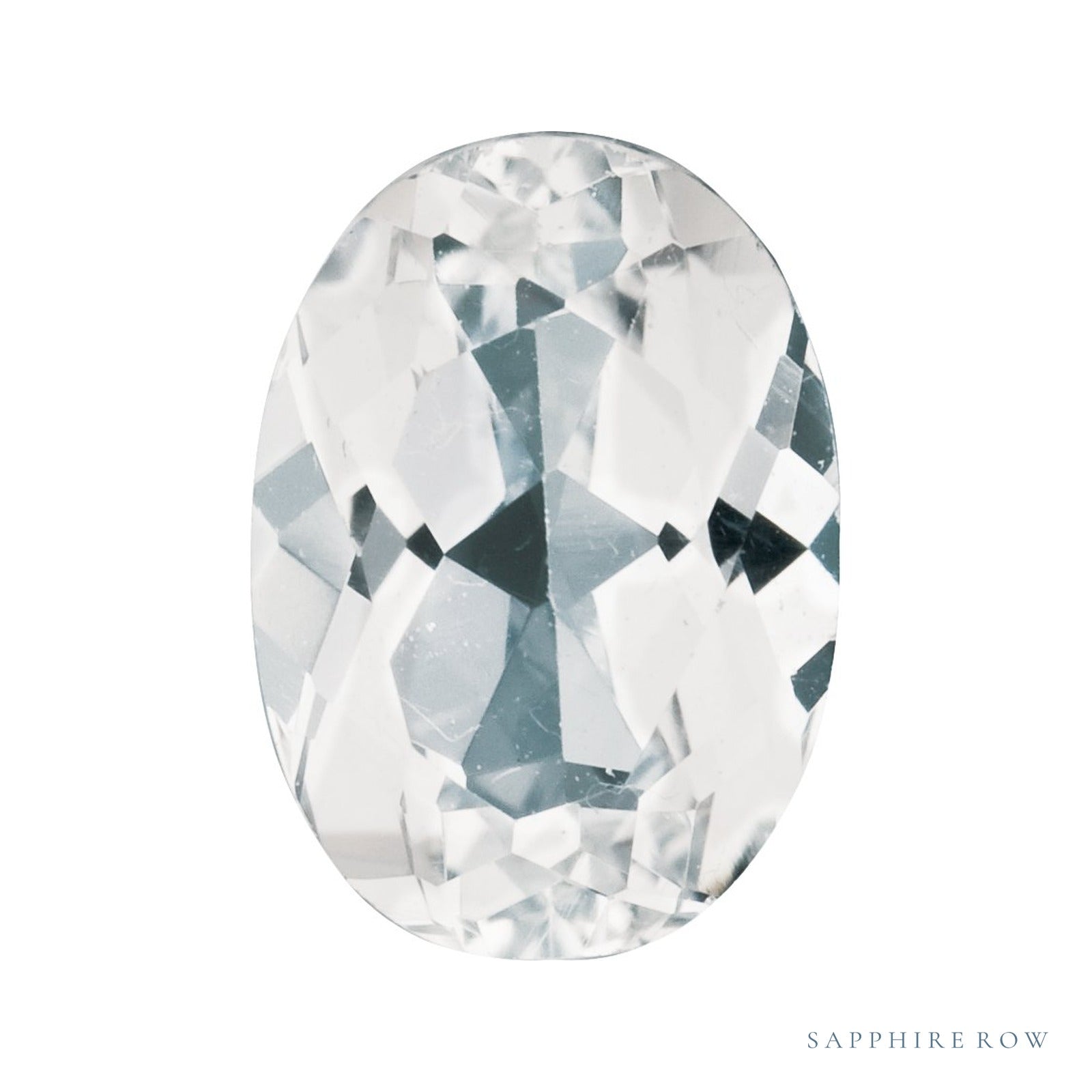 7x5 mm natural white topaz, oval cut | Sapphire Row · cut4