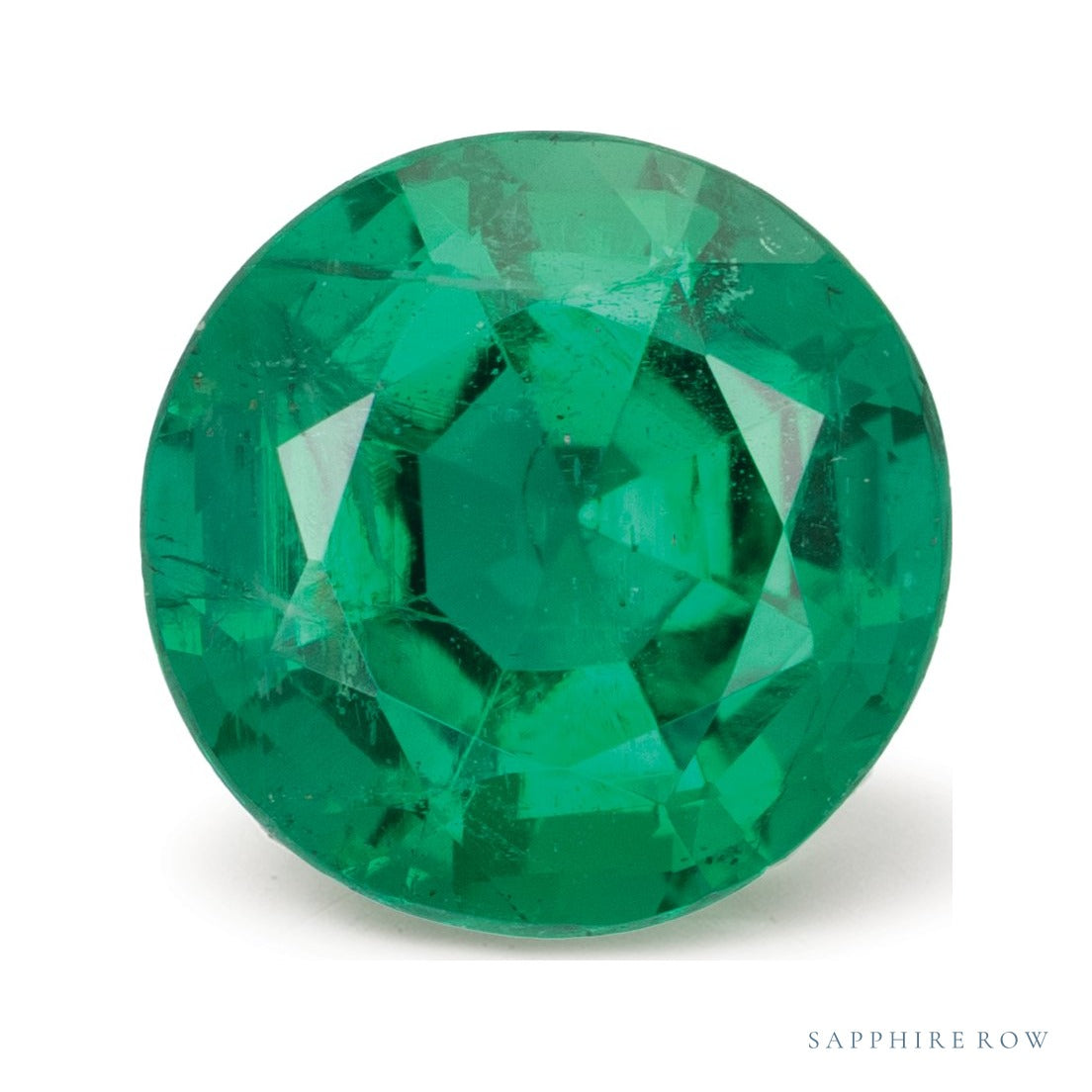 1.95 ct natural green emerald from Zambia, round cut | Sapphire Row · cut7