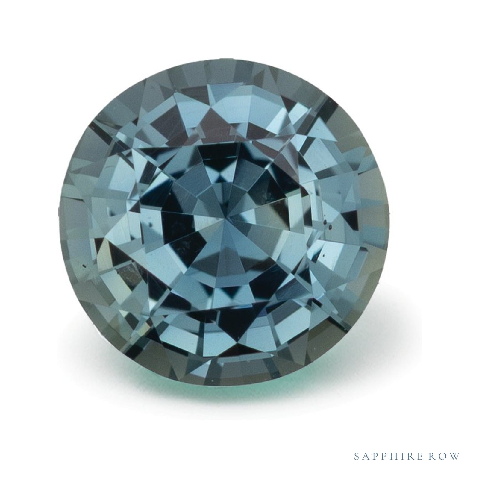 1.58 ct natural green sapphire from Tanzania, round cut | Sapphire Row · cut4