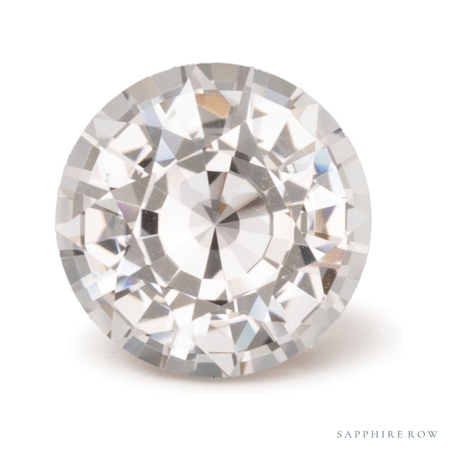 1.33 ct natural orange sapphire from Sri Lanka, round cut | Sapphire Row · cut4