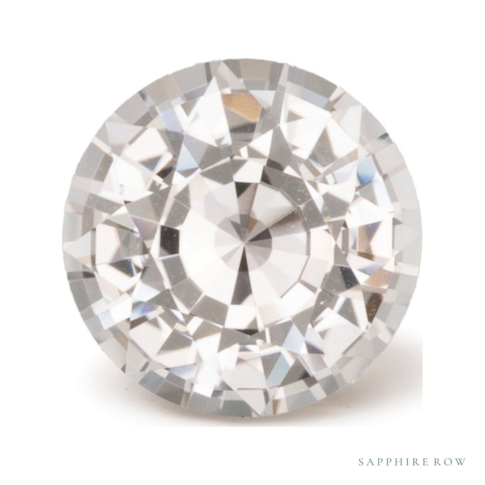 1.33 ct natural orange sapphire from Sri Lanka, round cut | Sapphire Row · cut4