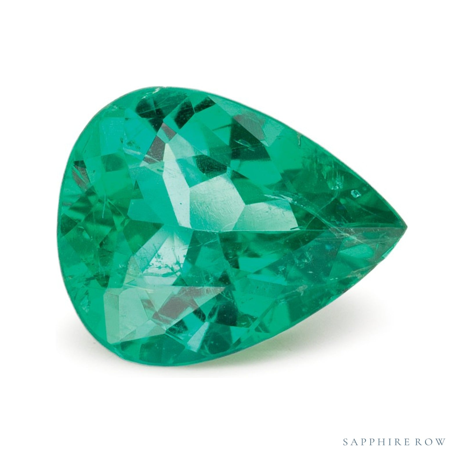 1.28 ct natural green emerald from Brazil, pear cut | Sapphire Row · cut4