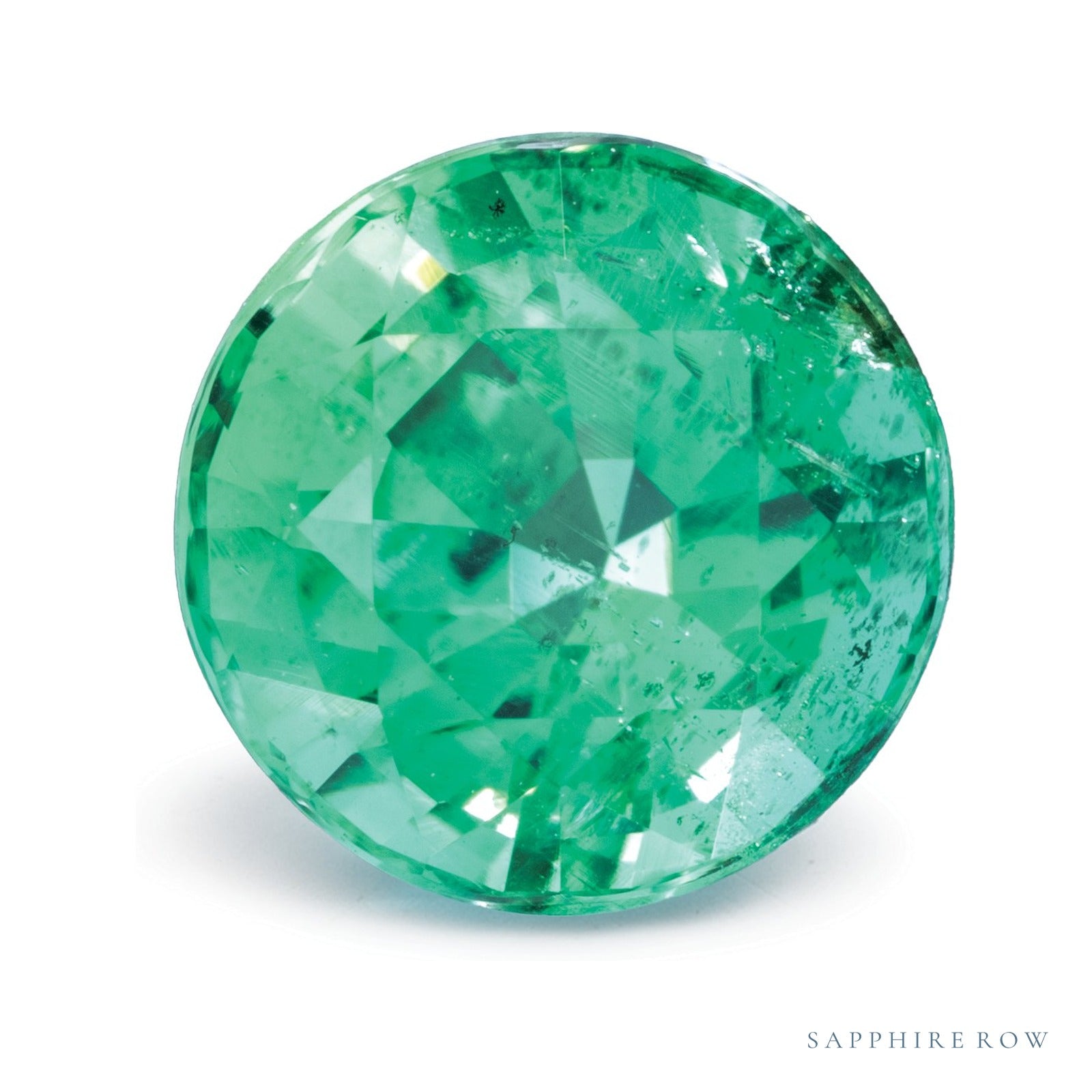 0.97 ct natural green emerald from Zambia, round cut | Sapphire Row · cut4