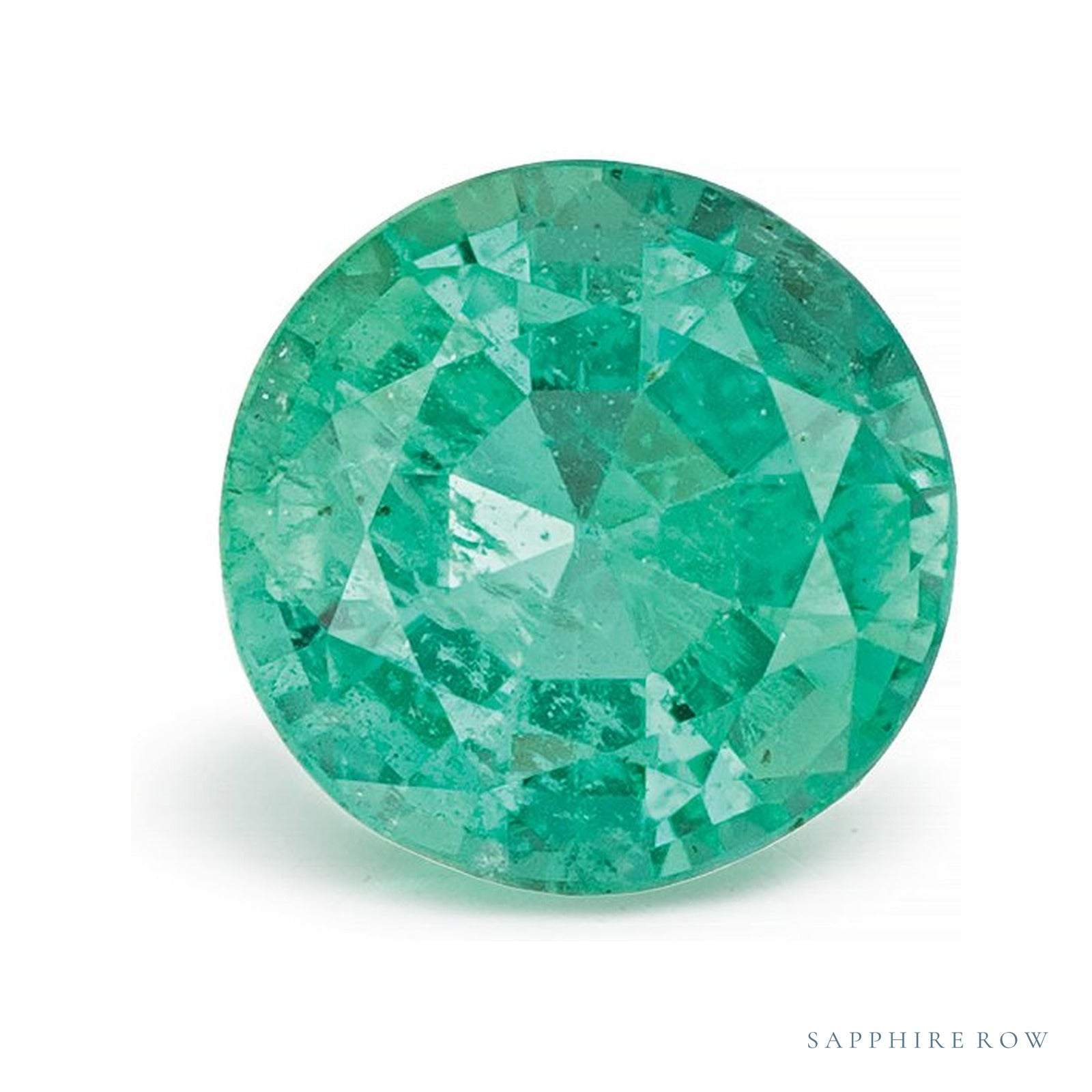 0.96 ct natural green emerald from Zambia, round cut | Sapphire Row · cut4