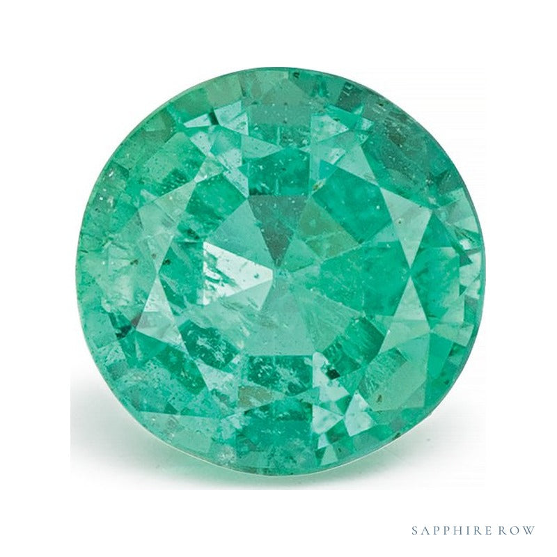 0.96 ct natural green emerald from Zambia, round cut | Sapphire Row · cut7