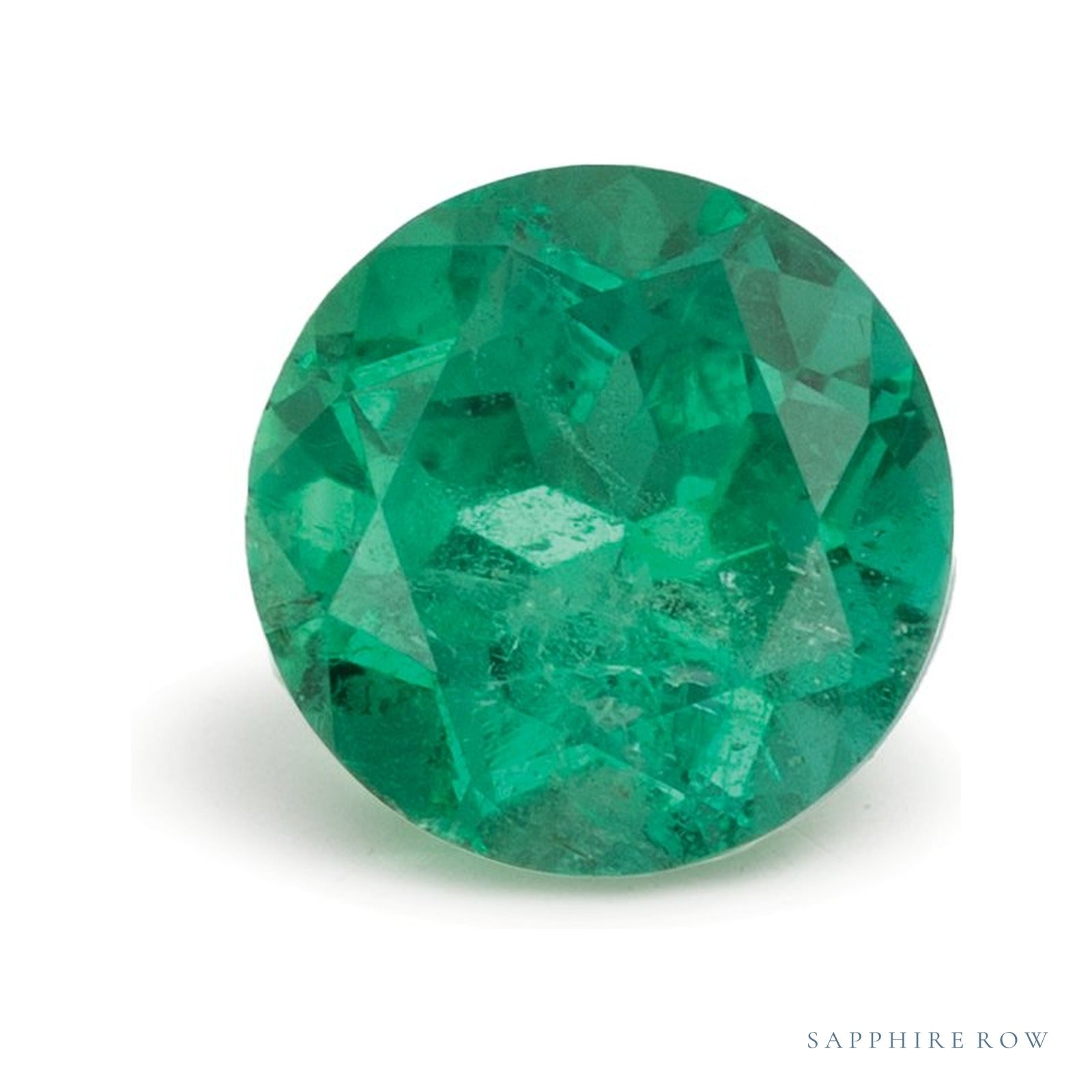 0.95 ct natural green emerald from Zambia, round cut | Sapphire Row · cut4