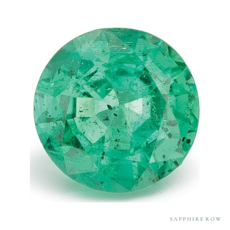 0.85 ct natural green emerald from Zambia, round cut | Sapphire Row · cut7