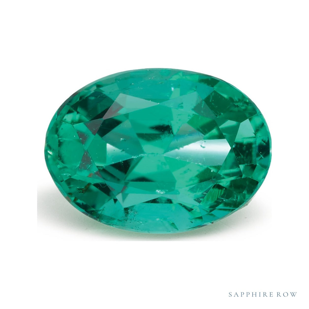 0.84 ct natural green emerald from Zambia, oval cut | Sapphire Row · cut7