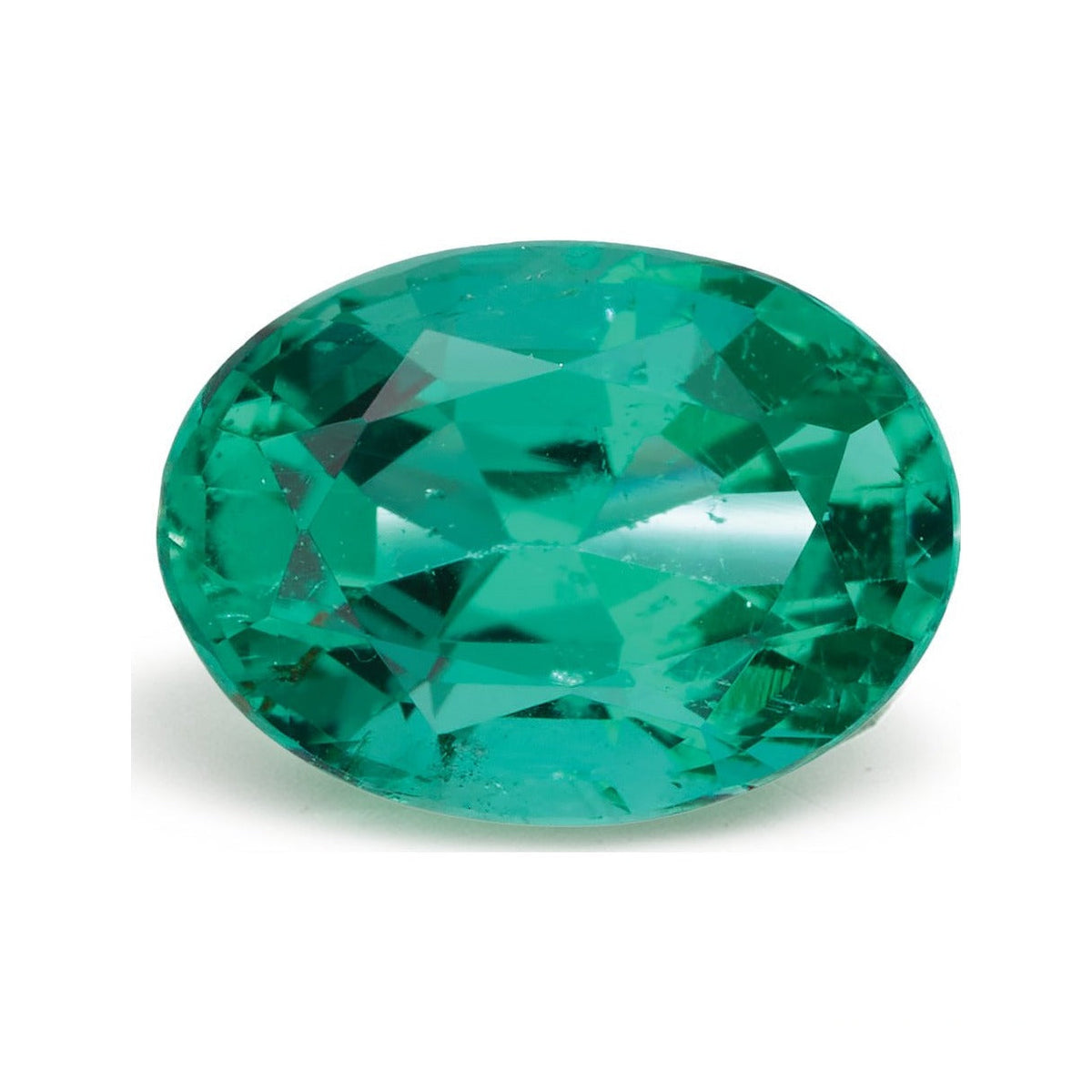 0.84 ct natural green emerald from Zambia, oval cut | Sapphire Row · cut7
