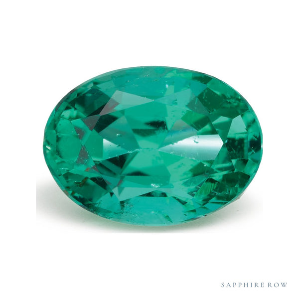 0.84 ct natural green emerald from Zambia, oval cut | Sapphire Row · cut7