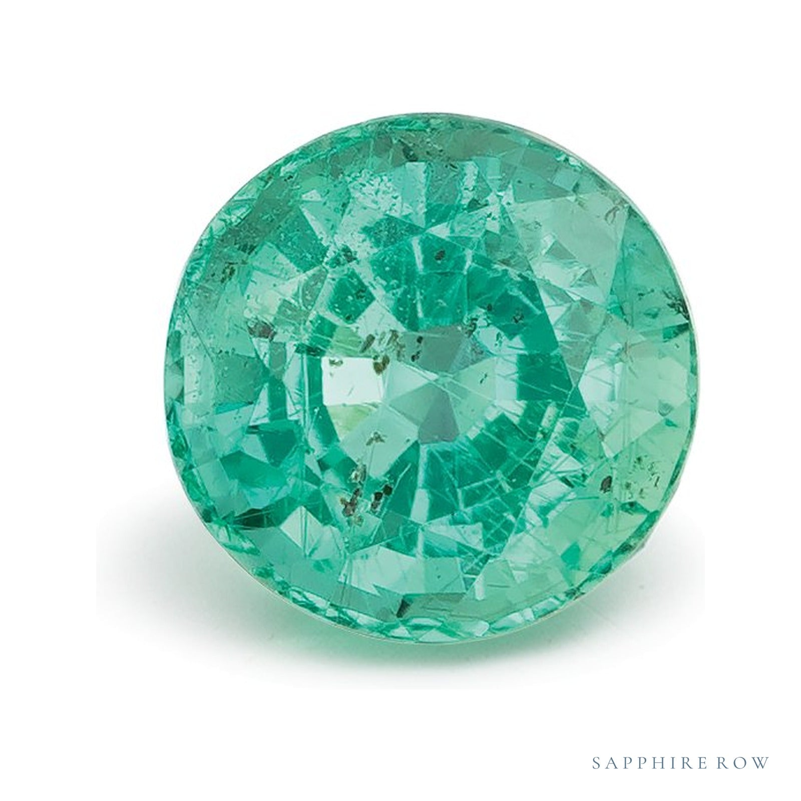 0.84 ct natural green emerald from Zambia, round cut | Sapphire Row · cut4