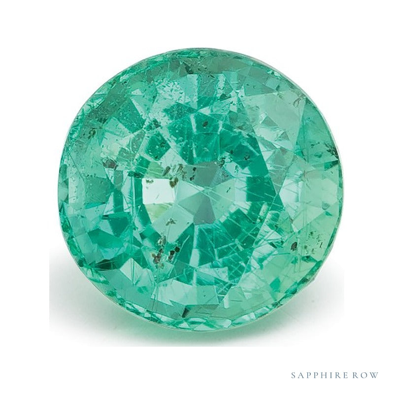 0.84 ct natural green emerald from Zambia, round cut | Sapphire Row · cut7