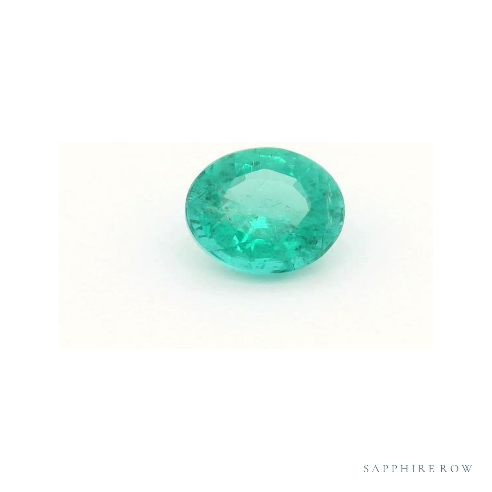 0.83 ct natural green emerald from Zambia, round cut | Sapphire Row · cut4