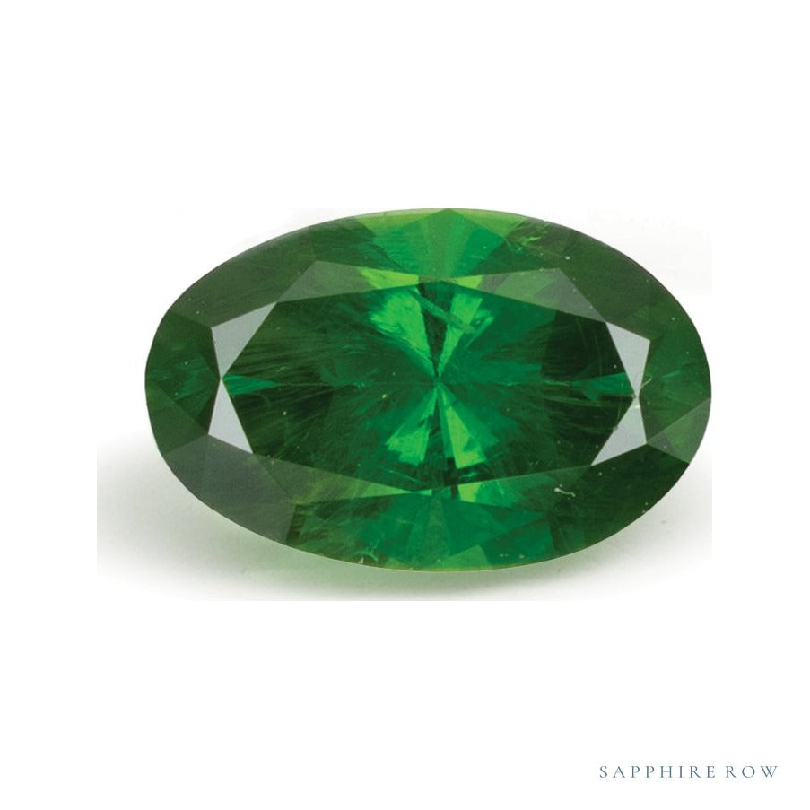 0.82 ct natural demantoid garnet, oval cut | Sapphire Row · cut7