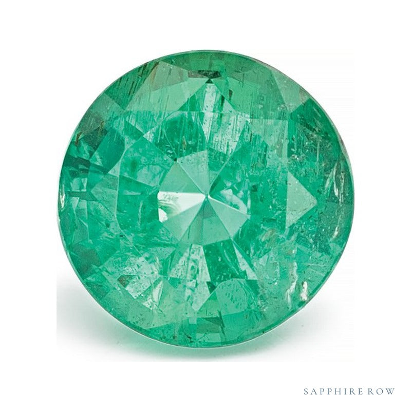 0.78 ct natural green emerald from Zambia, round cut | Sapphire Row · cut7