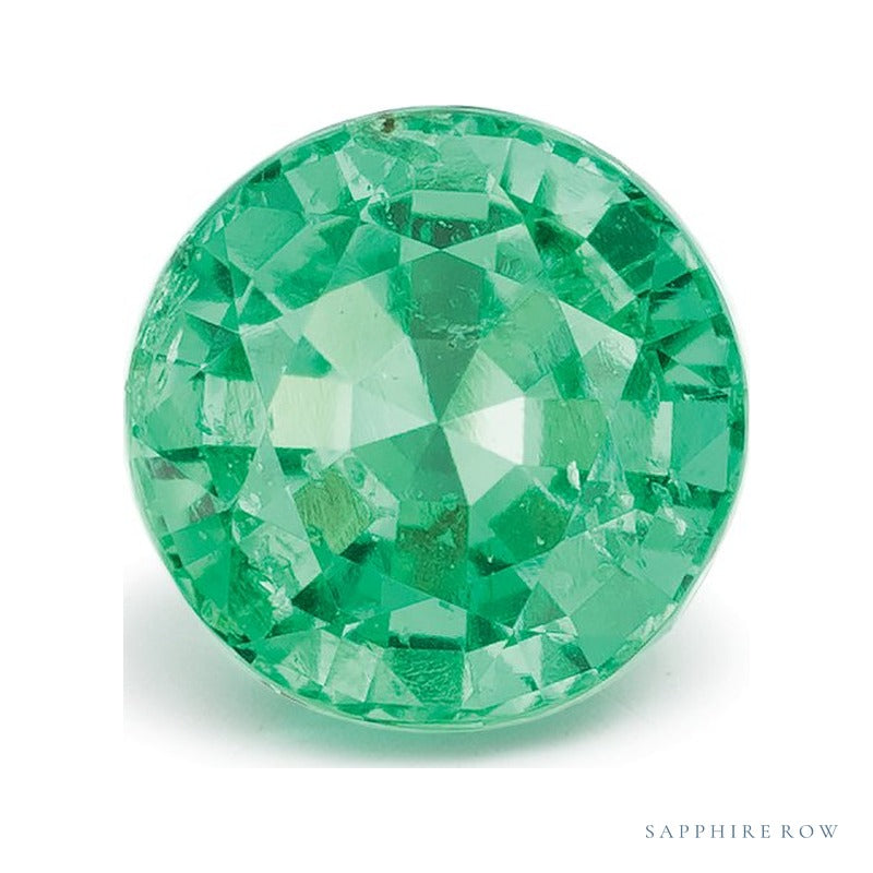 0.77 ct natural green emerald from Zambia, round cut | Sapphire Row · cut7