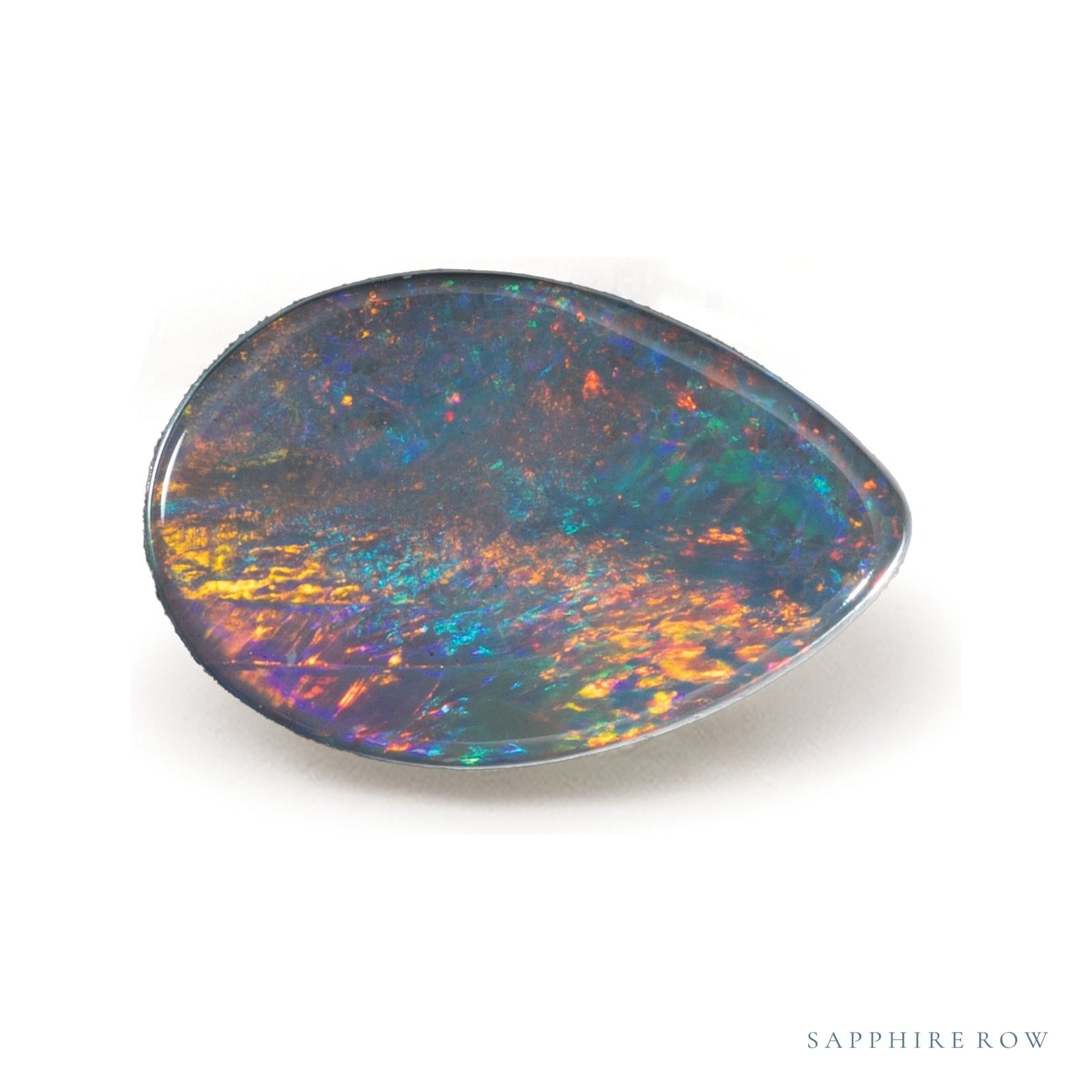 0.76 ct natural green opal from Australia, pear cut | Sapphire Row · cut4