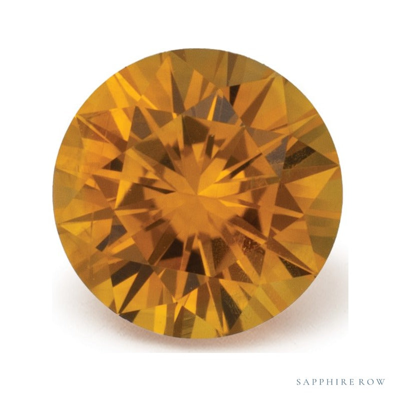 0.75 ct natural orange sapphire, round cut | Sapphire Row · cut7