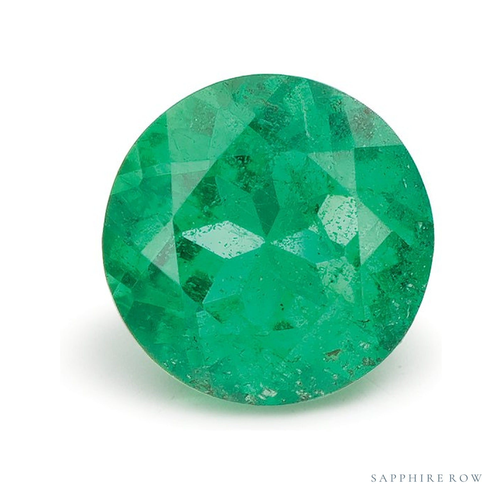 0.70 ct natural green emerald from Zambia, round cut | Sapphire Row · cut4