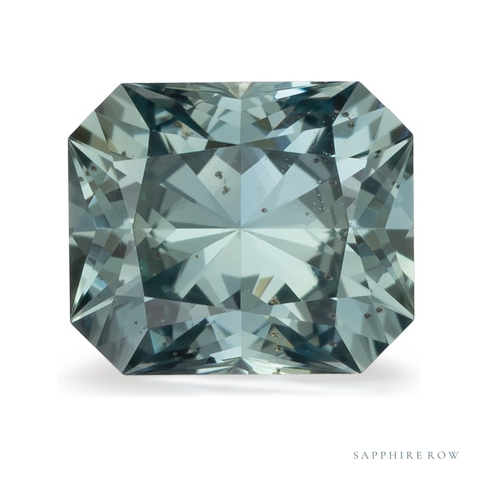 0.68 ct natural green sapphire from Tanzania, radiant cut | Sapphire Row · cut4