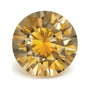 0.66 ct natural orange sapphire from Montana, round cut | Sapphire Row · cut7