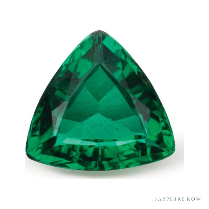0.42 ct natural green emerald from Brazil, trillion cut | Sapphire Row · cut7
