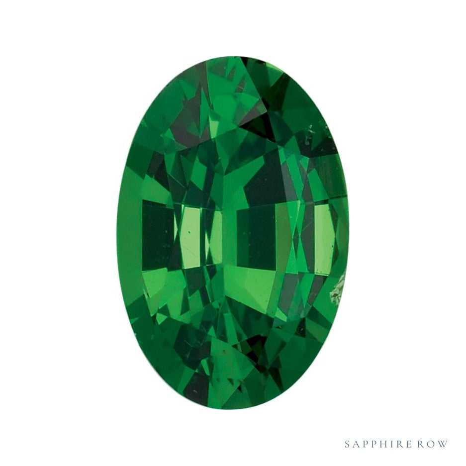 7x5 mm natural green tsavorite garnet, oval cut | Sapphire Row · cut7