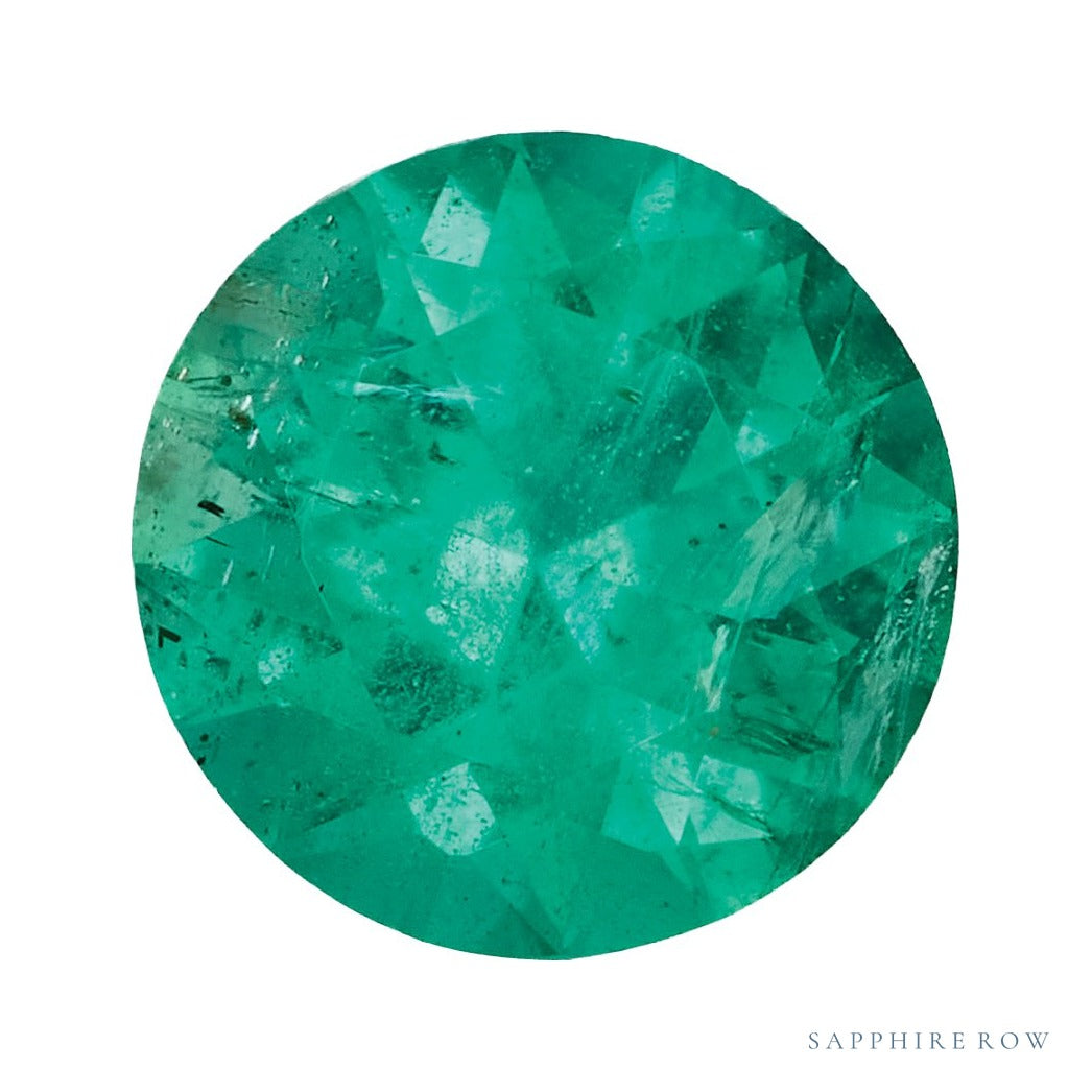 4.5 mm natural green emerald, round cut | Sapphire Row · cut7