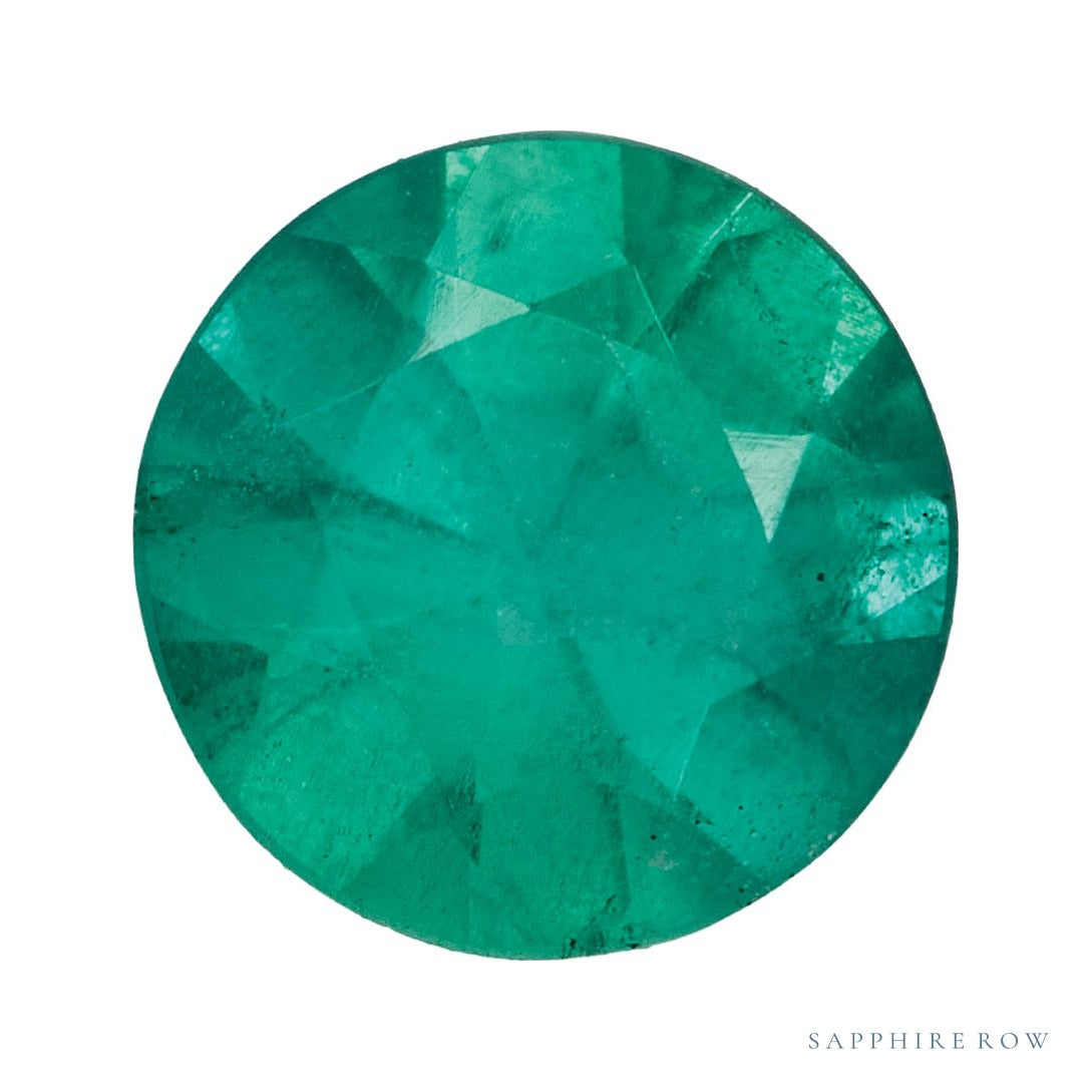 4.5 mm natural green emerald, round cut | Sapphire Row · cut7