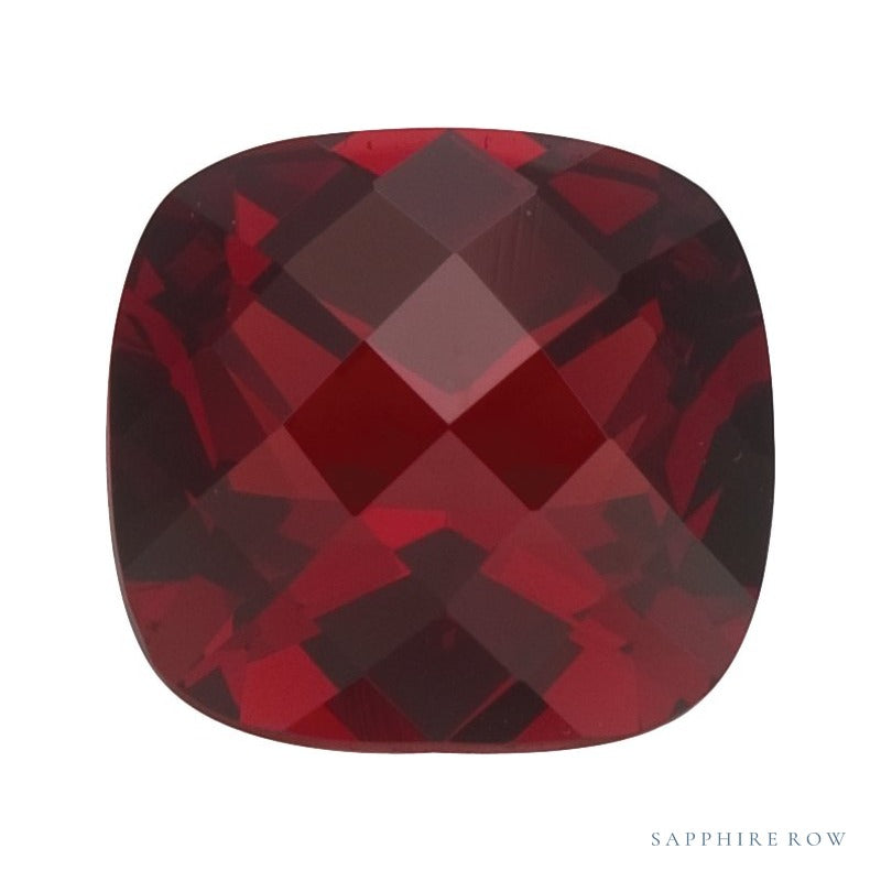 7 mm natural dark orange red mozambique garnet, cushion cut | Sapphire Row · cut6