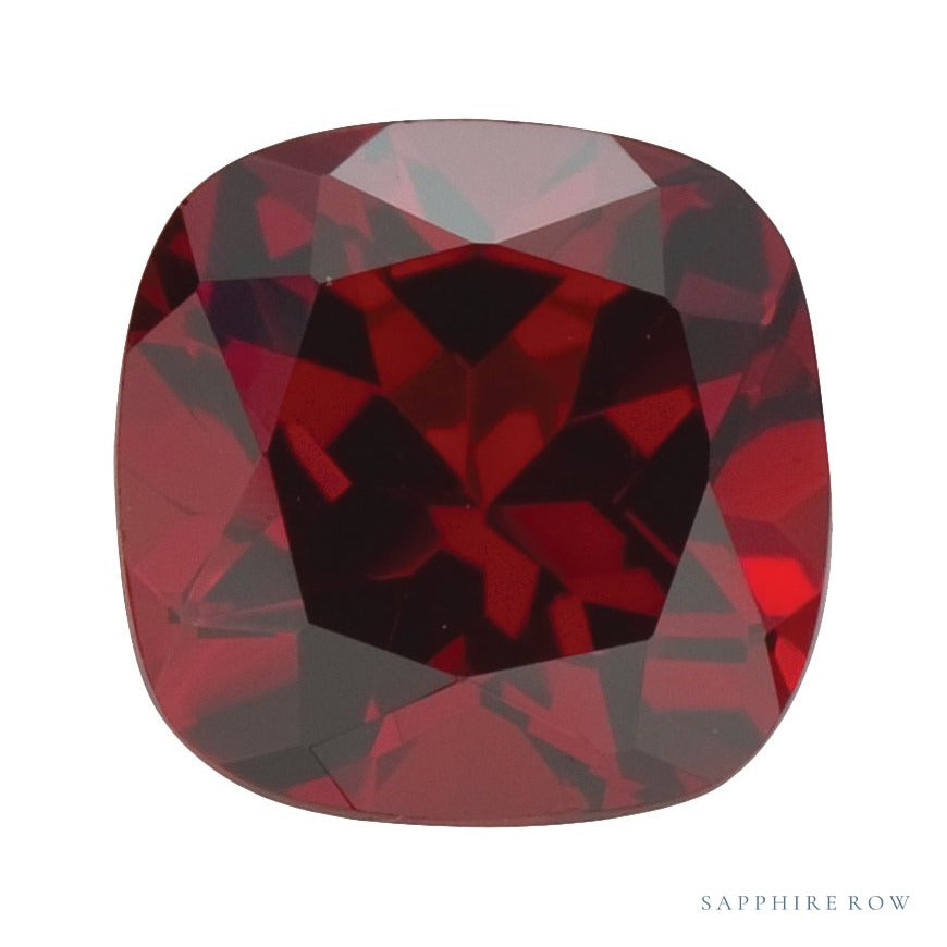 6 mm natural dark orange red mozambique garnet, cushion cut | Sapphire Row · cut6