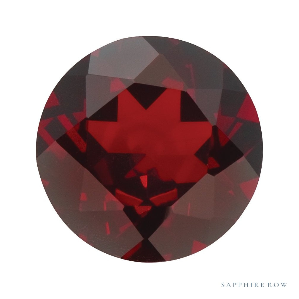 7 mm natural dark orange red mozambique garnet, round cut | Sapphire Row · cut6