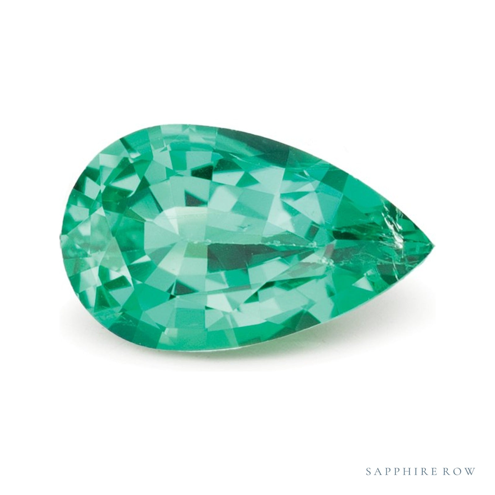 0.71 ct Natural Green Emerald (Oiled) – Pear Cut — Sapphire Row · cut4