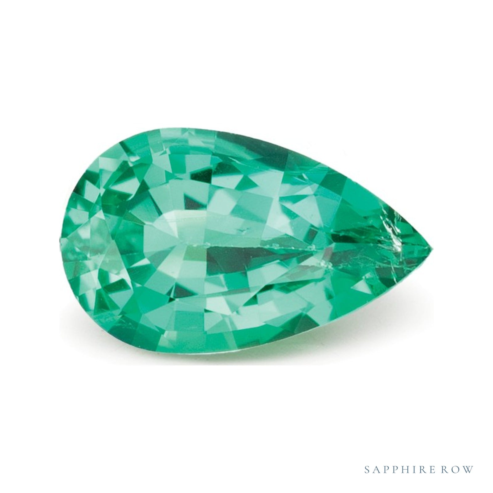 0.71 ct Natural Green Emerald (Oiled) – Pear Cut — Sapphire Row · cut4