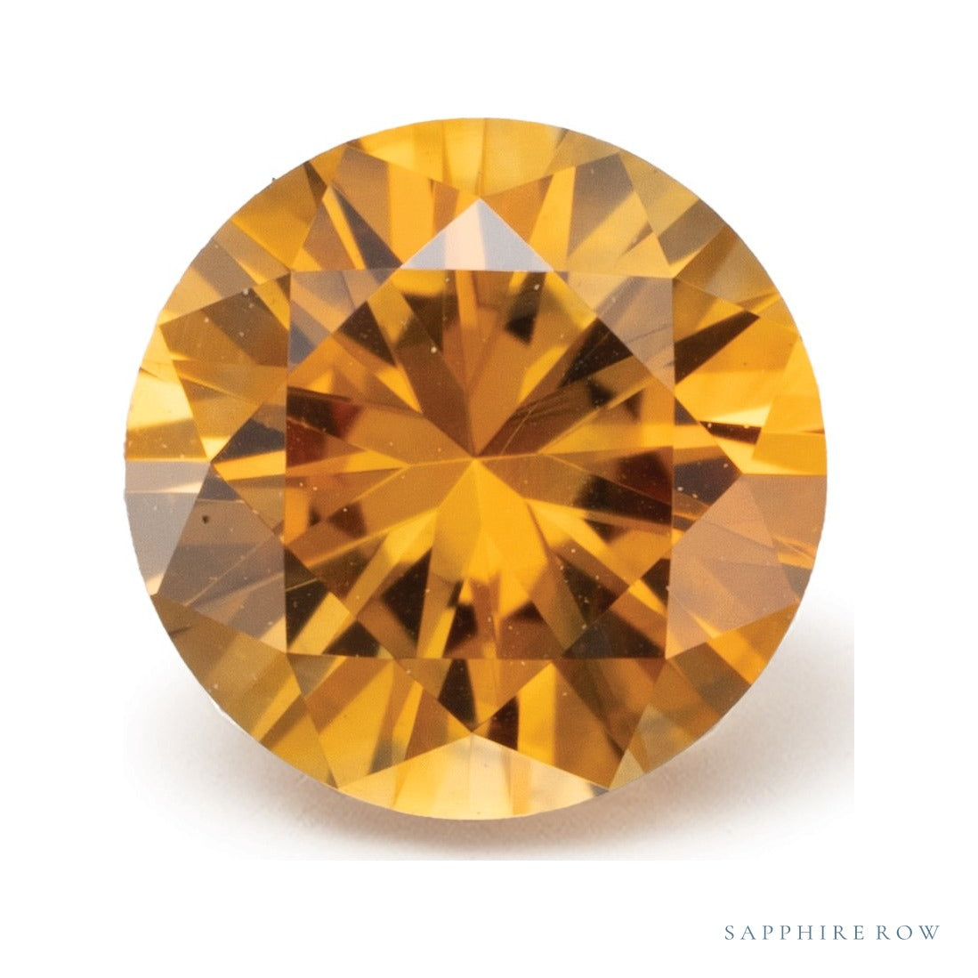 0.39 ct Natural Orange Sapphire (Heated) – Round Cut — Sapphire Row · cut7